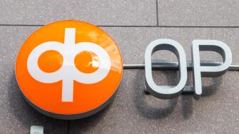 Kouvola, Finland - 22 September, 2019: OP-Pohjola Group bank sign on the wall of bank office.