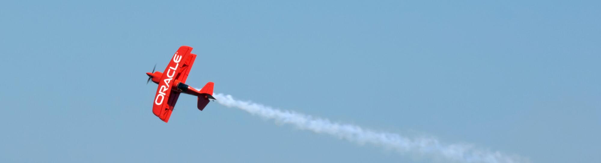 The Oracle stunt biplane climbs into the skies at the 2010 Chicago Air and Water Show.