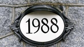 1988 house number on ornate oval plaque