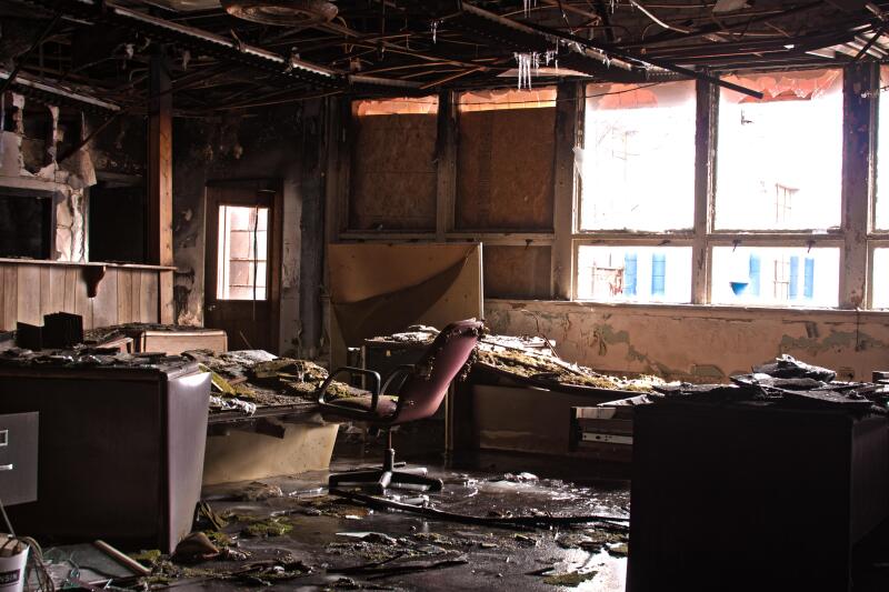 Abandoned office space with leaky roof