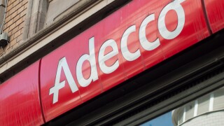 Mulhouse- France - 31 August 2019 - Closeup of Adecco sign on building facade, Adecco is the famous french Temporary work agency