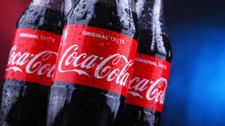 POZNAN, POLAND - NOV 29, 2018: Plastic bottles of Coca-Cola, a carbonated soft drink manufactured by The Coca-Cola Company headquartered in Atlanta, G