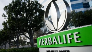 A logo sign outside of a facility occupied by Herbalife International in Torrance, California, on December 10, 2017.