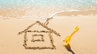 drawing of a house on the beach - concept safety and vacation