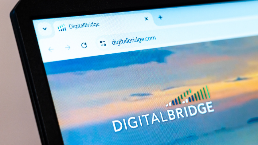 DigitalBridge official website displayed on a laptop screen, showcasing infrastructure investment and digital connectivity solutions