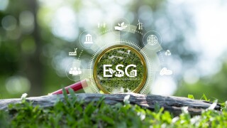 ESG, Environment, Society and Governance environmental concept social connections related icons Set of environmentally friendly icons around a magnifying glass, green background.