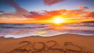 Happy New Year 2025 nature background, tropical beach shore and beautiful sunrise over the sea horizon