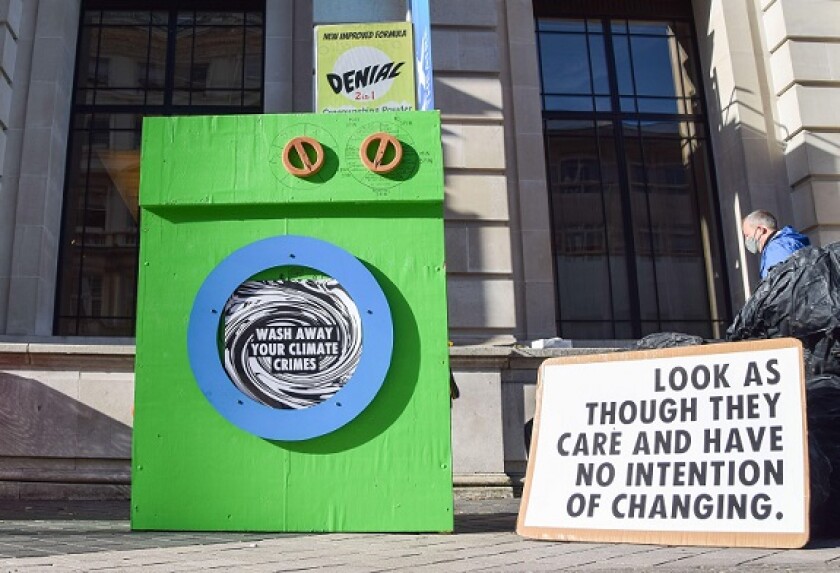 Greenwashing protest from Alamy 9Nov2021 cropped 575x375