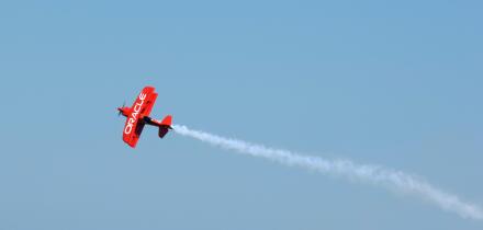 The Oracle stunt biplane climbs into the skies at the 2010 Chicago Air and Water Show.
