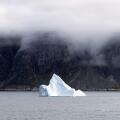 Greenland iceberg - one iceberg in a Greenland fjord, southern Greenland landscape, Arctic, Europe.