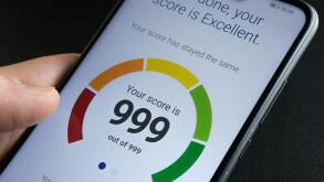 Stafford / United Kingdom - September 27 2020: Experian Credit Score report seen in the smartphone screen with the highest possible number. Real photo