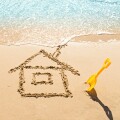 drawing of a house on the beach - concept safety and vacation