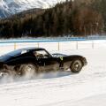 Classic vintage antique sports cars racing on the frozen lake of St Moritz