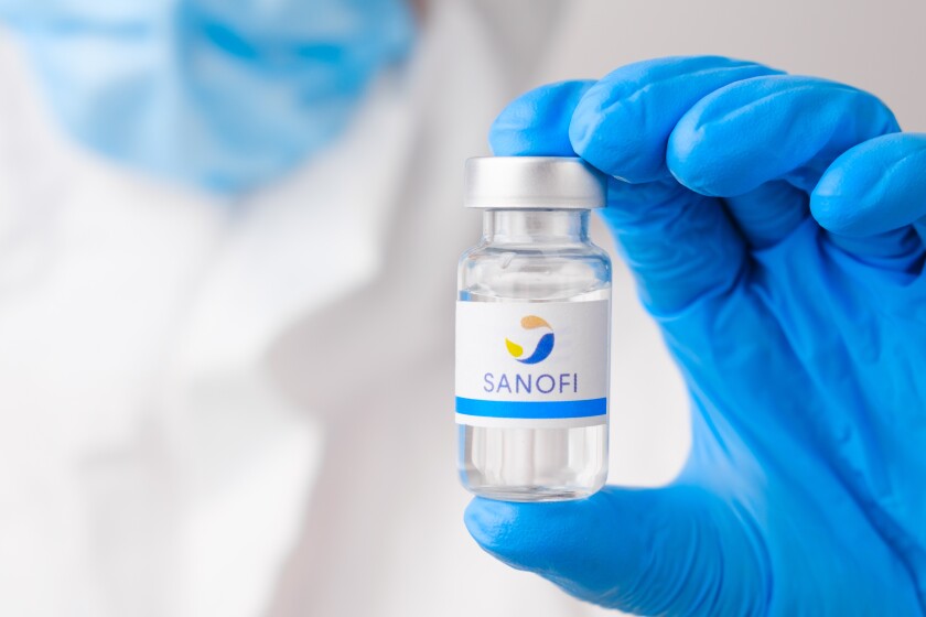Sanofi vial or bottle with pharmaceuticals demonstrated by health worker or scientist in rubber gloves, April 2021, San Francisco, USA