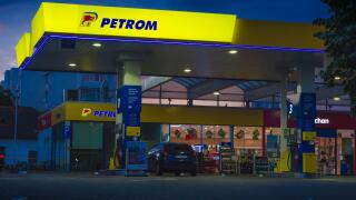Bucharest, Romania - June 22, 2022: A Petrom gas station is seen at night in Bucharest Editorial stock photo - stock image