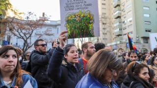 Montevideo, Uruguay. 23rd Aug, 2019. A protester holds a placard in front of the Brazilian embassy in Montevideo during the demonstration against fires in the Amazon. Credit: SOPA Images Limited/Alamy Live News