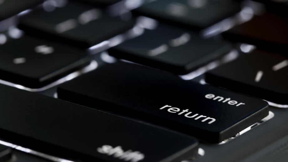 Illuminated Apple Macbook Pro keyboard return key - USA