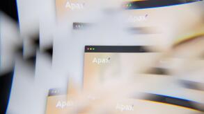 Milan, Italy - APRIL 10, 2021: Apax Partners logo on laptop screen seen through an optical prism, creative interpretation. Dynamic and unique image fr