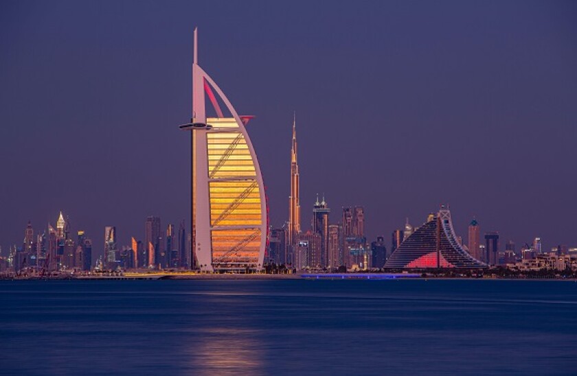 Dubai skyline with Burj Al Arab and Burj Khalifa at twilight, United Arab Emirates