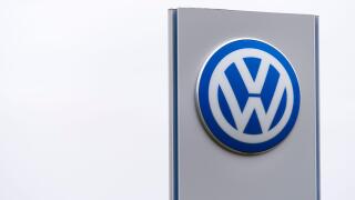 Volkswagen (VW) car manufacturer sign logo.