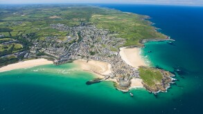Aerial view of coastline of St Ives in summer sun Cornwall England UK United Kingdom GB