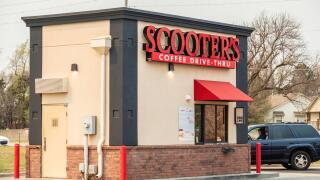 A female customer at Scooter's Coffee Drive-Thru shop on Maple Avenue, Wichita, Kansas, USA.