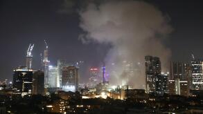 (250613) -- TEL AVIV, June 13, 2025 (Xinhua) -- Smoke rises following an Iranian missile attack in Tel Aviv, Israel, on June 13, 2025. Dozens of missiles were fired from Iran into Israel on Friday evening, according to statements issued by the Israel Defe
