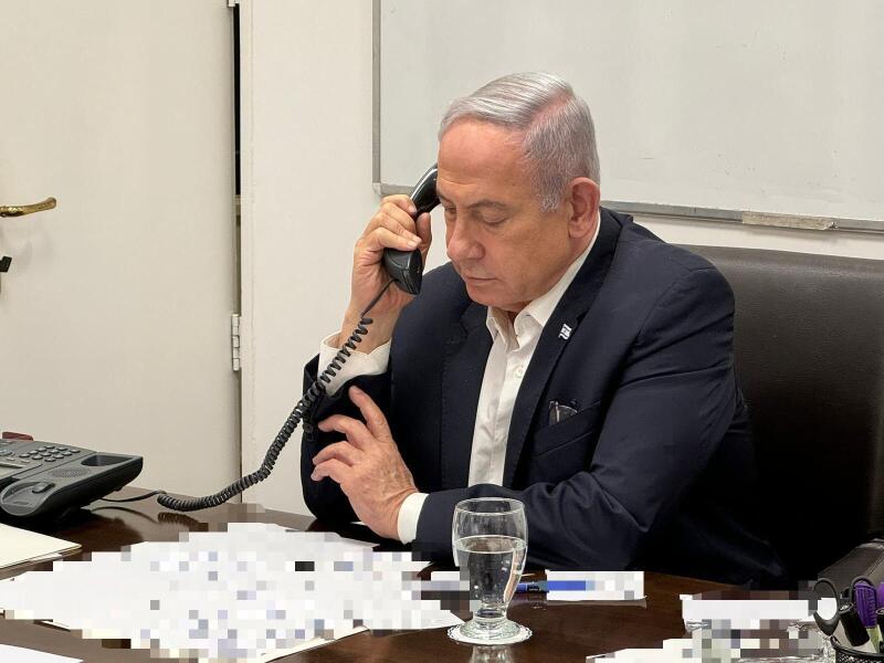 (240415) -- BEIJING, April 15, 2024 (Xinhua) -- This photo released on April 14, 2024 shows Israeli Prime Minister Benjamin Netanyahu making a phone call with U.S. President Joe Biden. U.S. President Joe Biden told Israeli Prime Minister Benjamin Netanyah