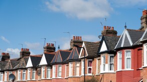 Row of terraced houses in residential Street, London, England, UK