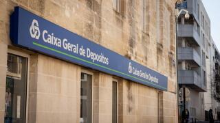 Picture of a sign with the logo of Caixa Geral de Depositos taken on their agency in the city center of Bordeaux, France. Caixa Geral de Depositos (CG