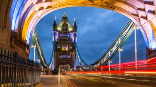 Bridge Tower night view from the bridge, London United Kingdom. A combined bascule and suspension bridge which crosses the River