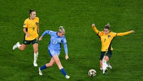 Sydney, Australia. 16th Aug, 2023. Alessia Russo of England is tackled by Steph Catley of Australia during the FIFA Women's World Cup 2023 Semi Final soccer match between Australia and England at Stadium Australia in Sydney, Wednesday, August 16, 2023. (A