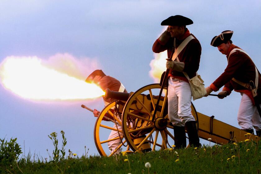 Shot from a historical cannon fire and smoke