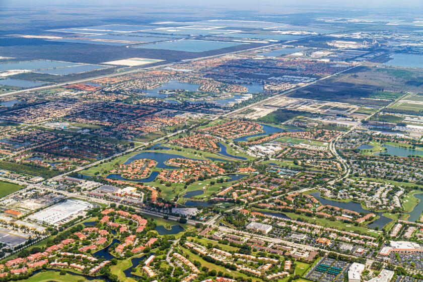 Miami Florida,Doral,aerial window seat view,departing MIA,roads,neighborhoods,golf course,edge of Everglades,FL110516044