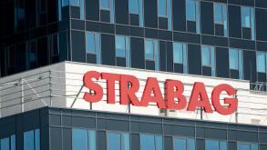 Strabag name plate red sign and logo on blue glass office building, Sofia Bulgaria, Eastern Europe, Balkans, EU