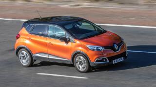 2015 orange black Renault Captur Dynamique S NAV DC; UK vehicular traffic, transport, moving vehicles, vehicle, roads, motors, motoring  on the M6 motorway highway