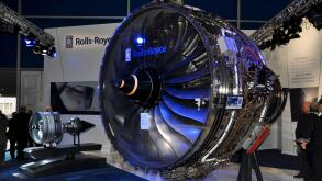 Rolls Royce Engines trade stand at the Farnborough International Airshow trade fair 2012, UK, with a Trent 1000 aero engine on display