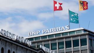 The building of the Credit Agricole (Suisse) S.A.and BNP Paribas are pictured in Geneva August 8, 2008.   REUTERS/Denis Balibouse   (SWITZERLAND)