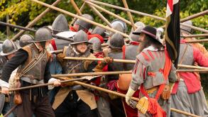 Push of pike where two opposing columns of pikemen meet and become locked in position. English civil war reenactment, Siege of Basing House 16.09.23