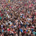 Crowd, many people in confined space, at a festival,