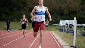 Inter-club athletics, runner winning men`s 800m race, Leamington Spa, Warwickshire, UK