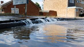 A new water leak flooding the road on Ladysmith Road, Cheltenham. 23rd July 2018