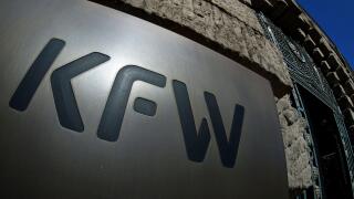 In this Tuesday, March 24, 2020 photo the logo of the 'KfW', Kreditanstalt fur Wiederaufbau, bank (Credit Institute for Reconstruction) is pictured in Berlin, Germany. (AP Photo/Michael Sohn)