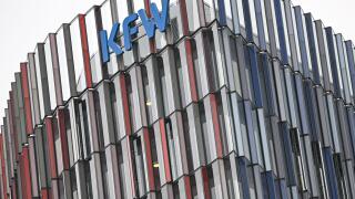 22 March 2024, Hesse, Frankfurt/Main: The logo of KfW Bankengruppe stands on the Westarkade. The state-owned promotional bank has presented its balance sheet for the past financial year 2023. Photo: Arne Dedert/dpa