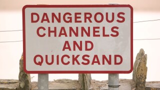 danger quicksnads sign on the Leven estuary near newby Bridge