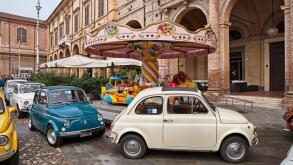 Vintage italian cars Fiat 500 in classic car rally during the feast Sagra dei sapori d'autunno. November 9, 2014 in Bagnacavallo, RA, Italy
