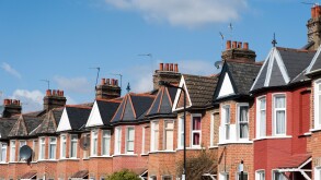 Row of terraced houses in residential Street, London, England, UK