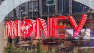 Large window sign at branch of Virgin Money bank in Birmingham city centre