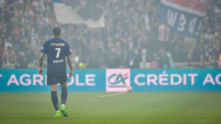 Paris Saint-Germain's forward Kylian Mbappe walks on the pitch during the French Cup final football match between Olympique Lyonnais and Paris Saint-Germain at the Decathlon Arena - Pierre Mauroy stadium in Lille on May 25, 2024. Photo by Firas Abdullah/A