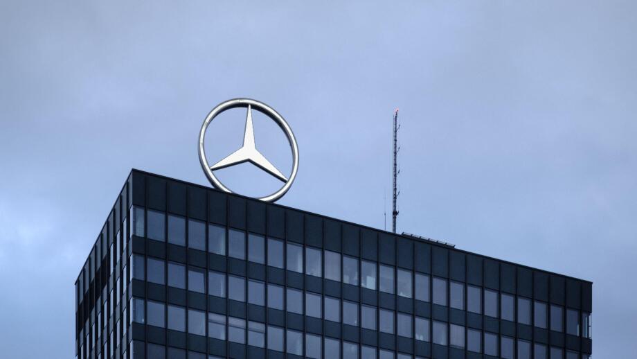 Mercedes-Benz rotating logo over the rooftop of the headquarter in Breitscheidplatz, Berlin, Germany